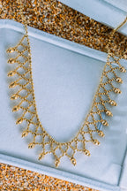 Gargantilla elegante de bolitas 14K
