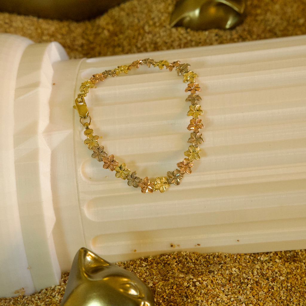 Pulsera de Flores de Tres Oros 10K