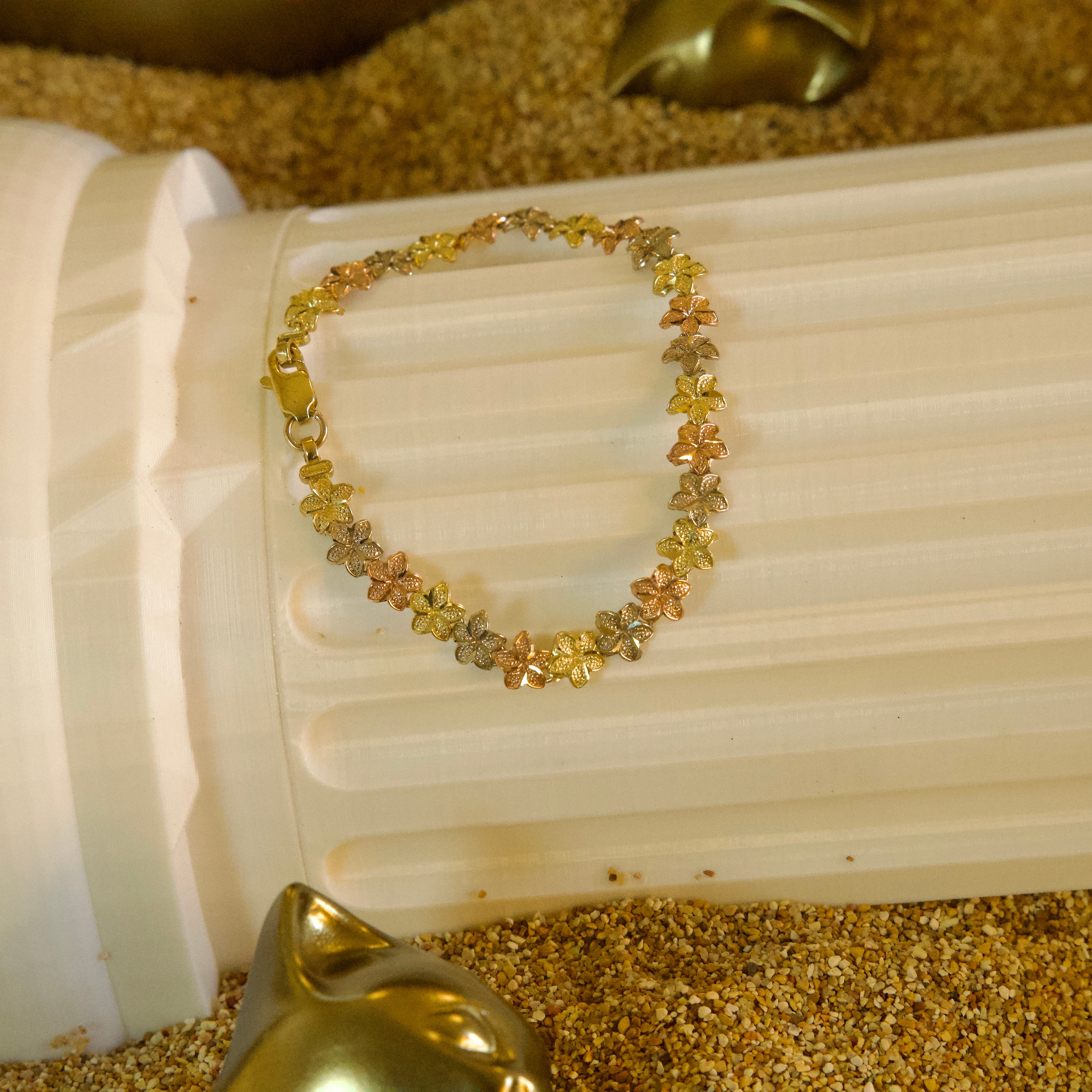 Pulsera de Flores de Tres Oros 10K