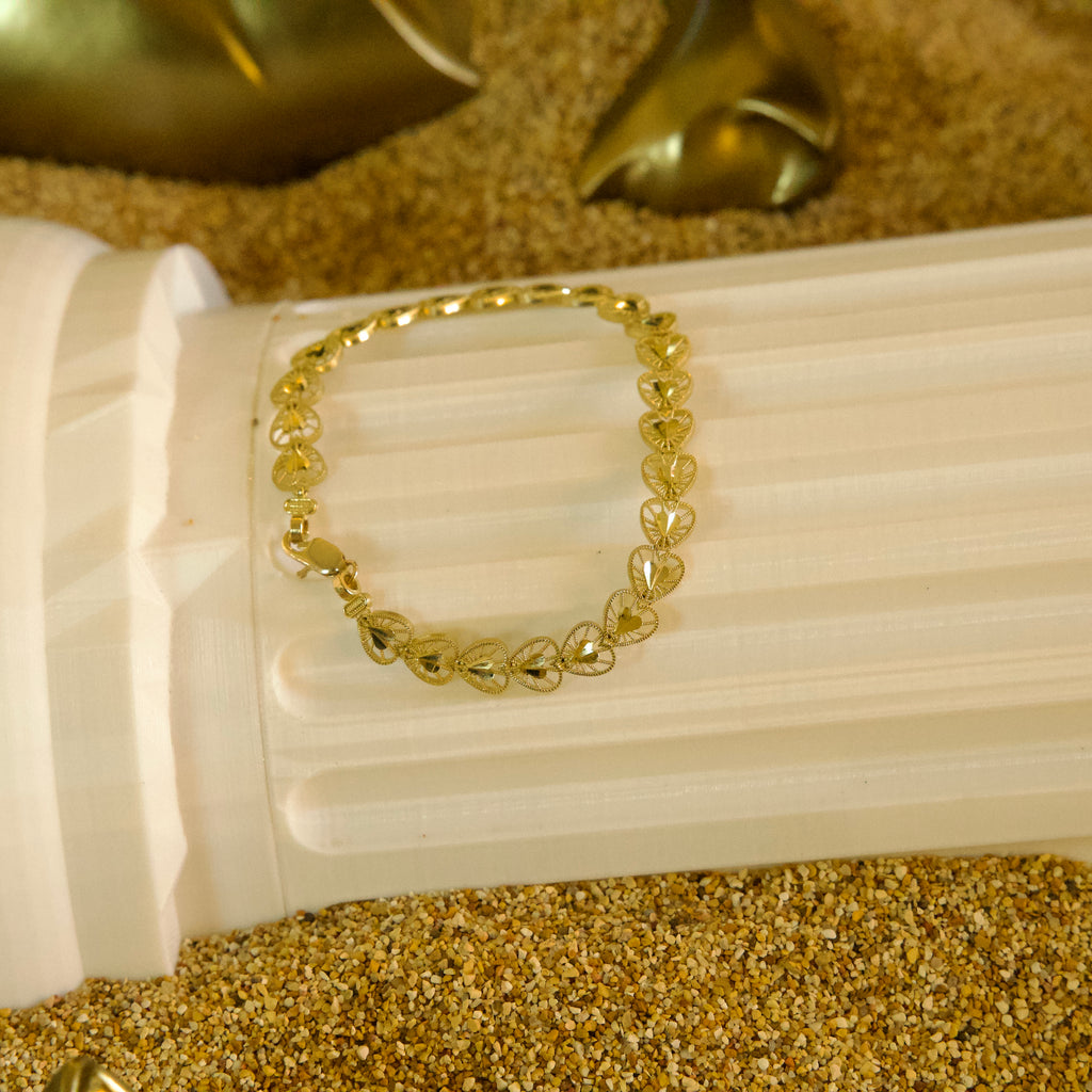 Pulsera de corazones 10K