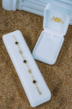 Pulsera treboles negros y corazones 10K