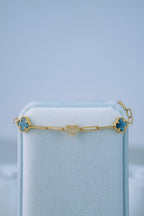 Pulsera treboles negros y corazones 10K