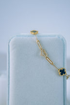 Pulsera treboles negros y corazones 10K