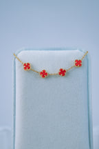 Pulsera 4 treboles rojos 10K