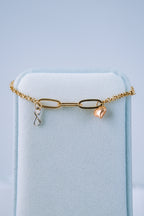Pulsera vacía con dije infinito y corazón 3 oros 10K