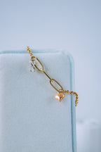 Pulsera vacía con dije infinito y corazón 3 oros 10K