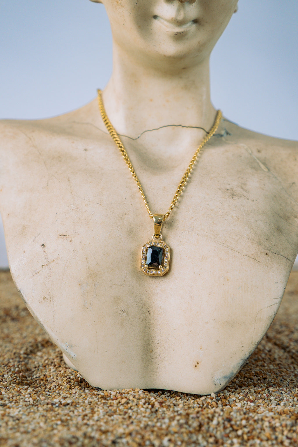 Dije piedra negra rectangular 10K