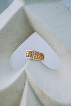 Anillo Versace cuadrado negro 10K