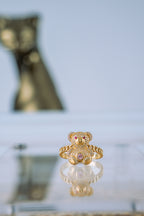 Anillo de oso piedra rosada 14K