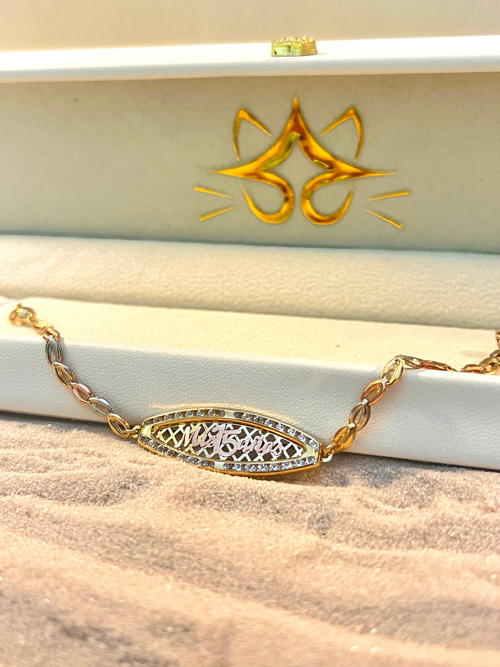Pulsera 15 años con placa ovalada 3 oros 10K