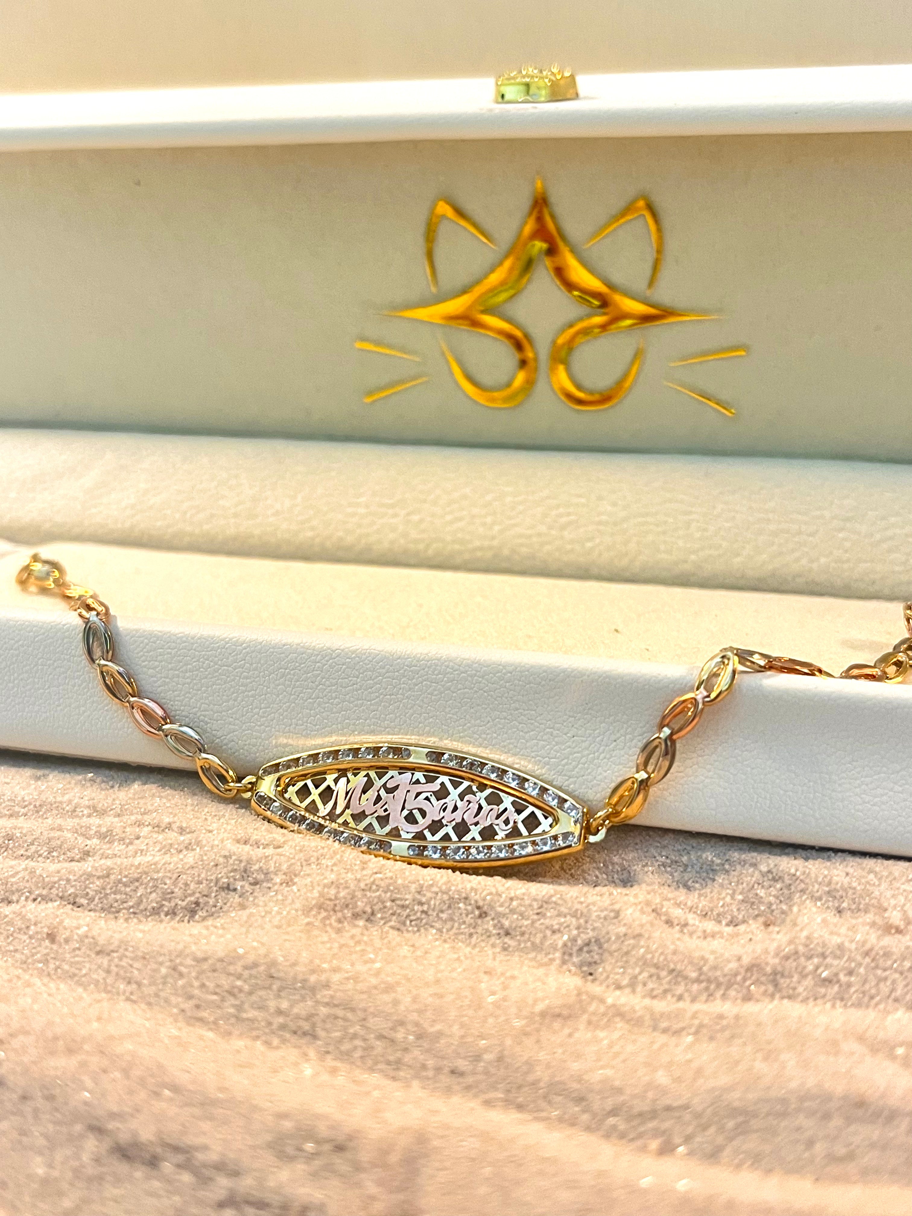 Pulsera 15 años con placa ovalada 3 oros 10K