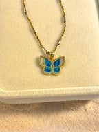 Dije de mariposa celeste 10K
