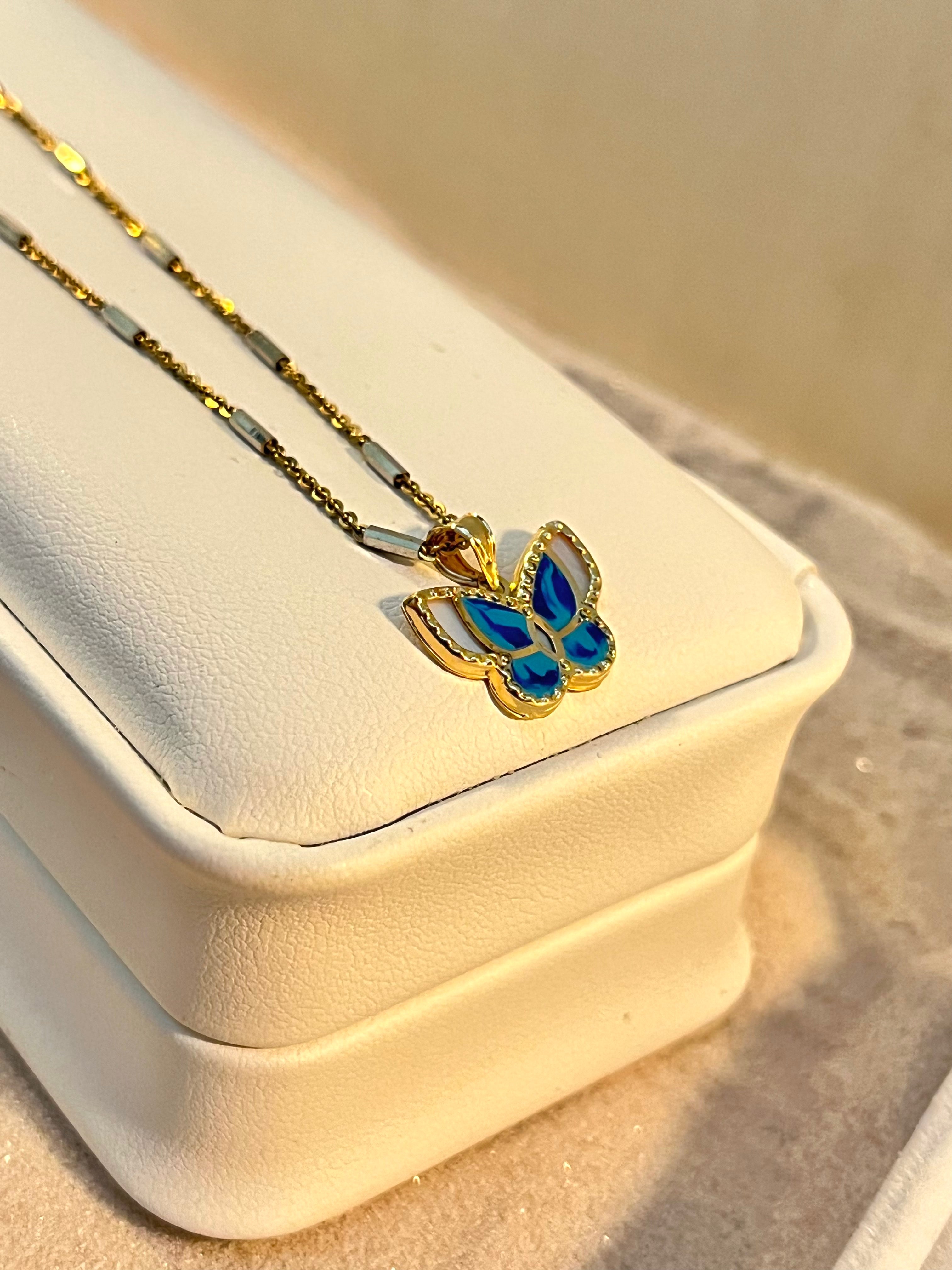 Dije de mariposa celeste 10K