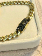 Pulsera Monaco con corazón de piedras negras 10K