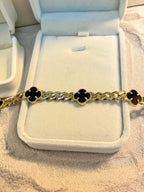 Pulsera de treboles negros 10K