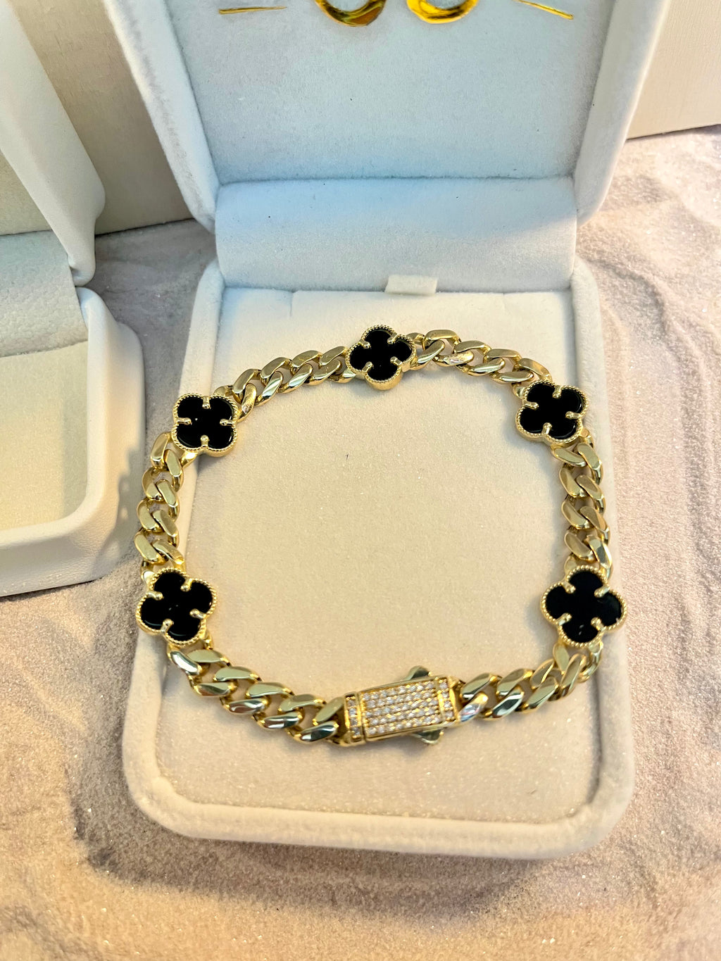 Pulsera de treboles negros 10K